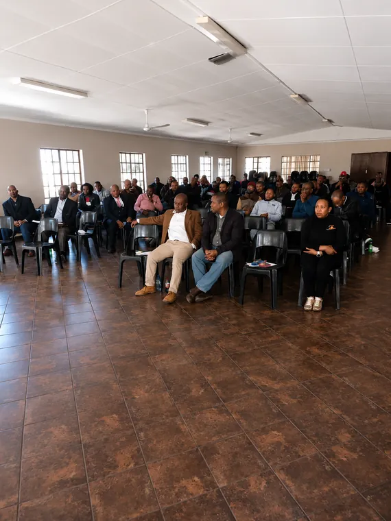 Men attending a Khuluma Ndoda campaign session